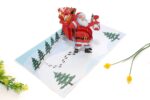 santa-holding-lamp-pop-up-card-03