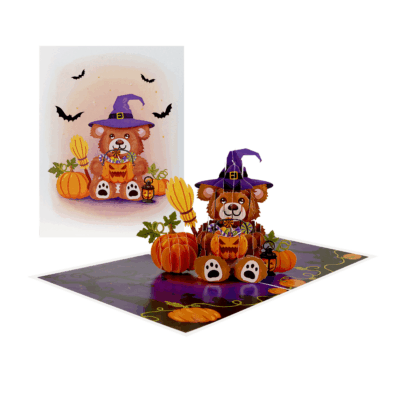 Cute Halloween bear with candy and broom in handmade pop-up card