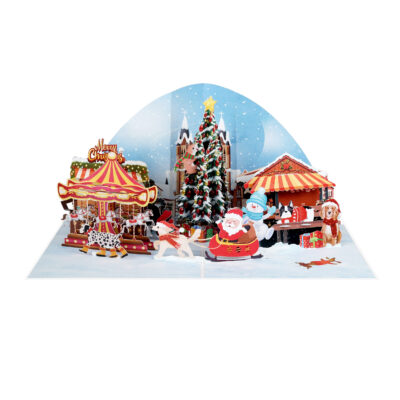 Pop-up greeting card featuring holiday village and Christmas carousel