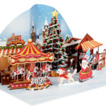 Santa sleigh and festive scene in a holiday pop-up card