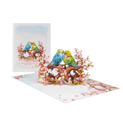 Romantic pop-up greeting card featuring lovebirds and cherry blossoms