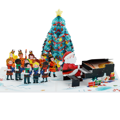 Christmas Choir Pop Up Card featuring Santa Claus playing the piano beside a Christmas tree and a festive choir in a handcrafted 3D holiday greeting card.